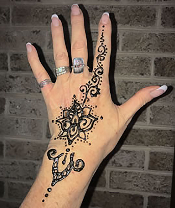 Hand and wrist henna design